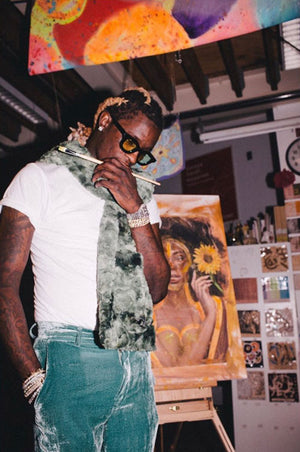 Young Thug wears the Mitten Hood Scarf